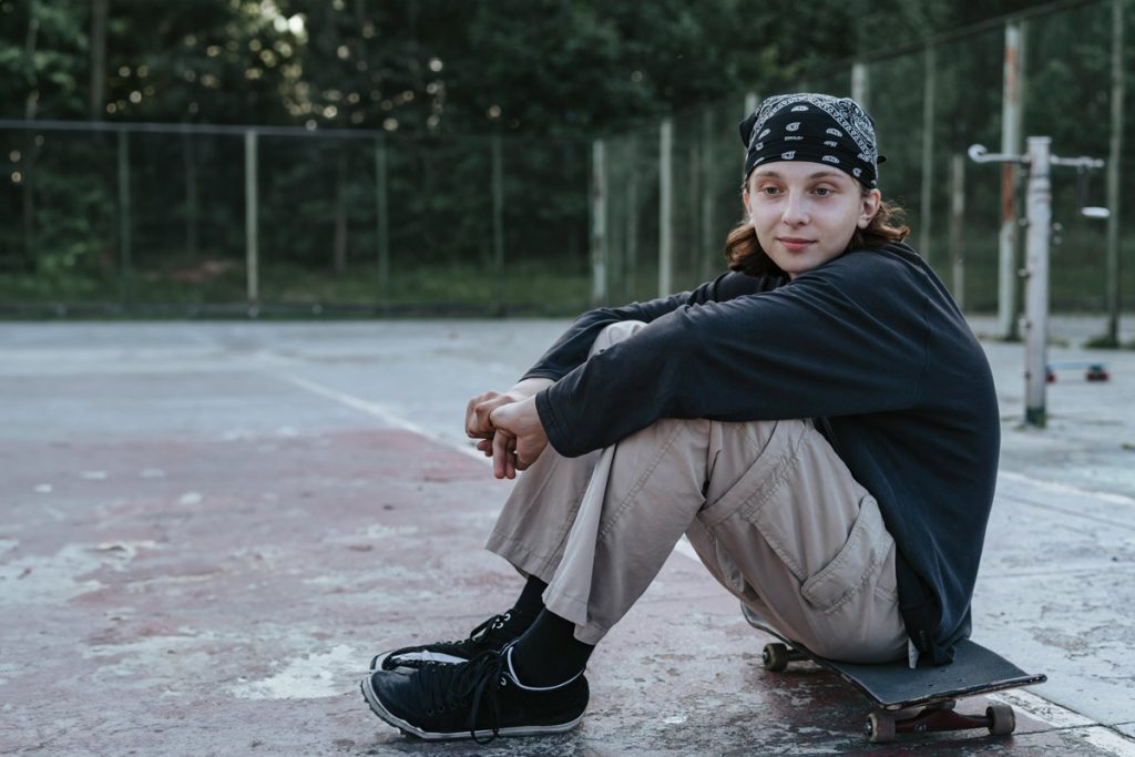 teen boy with skateboard