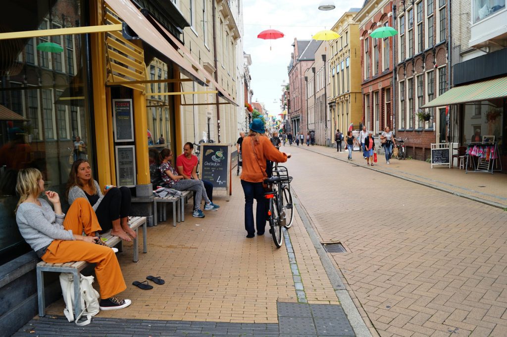 People gathering in urban neighborhood