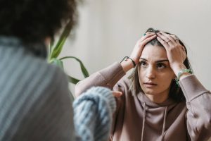 Anxious woman talking to partner