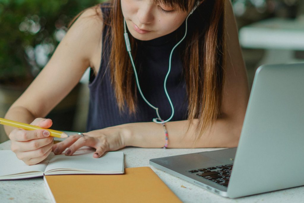 Close-up of female college student studying.